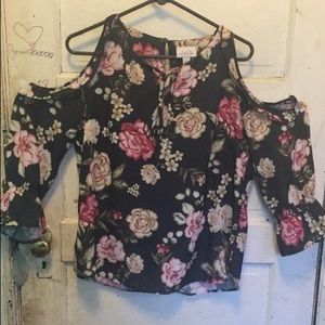 A black shirt with a touch of pink